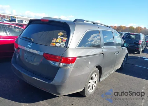 2014 Honda Odyssey Ex-L z USA, uszkodzony, nr VIN 5FNRL5H60EB031424